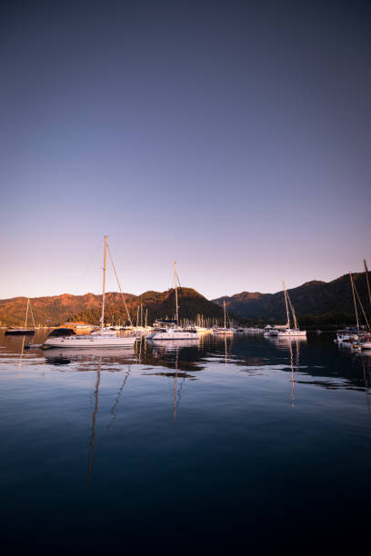 istock Yachts in bay with morning light 831043446