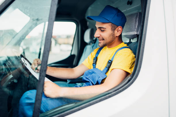 istock Cargo delivery, driver courier sitting in truck 831049462