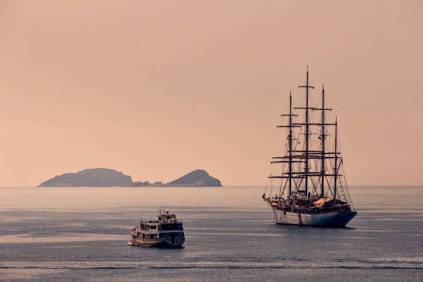 Big sailboat with four masts anchored in front of island Lokrum near Dubrovnik