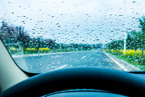 istock Driving car in rainy day 831057376