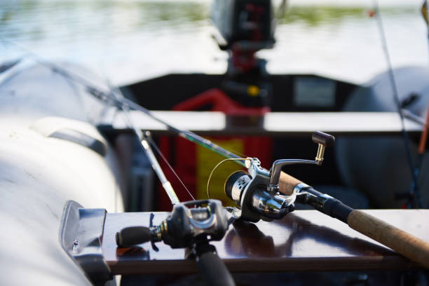 istock Fishing rods with spinning reels in boat 831060970