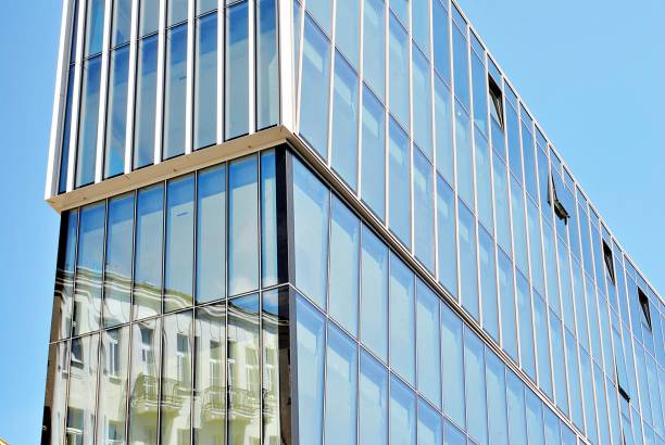 istock Modern building.Modern office building with facade of glass 831064086