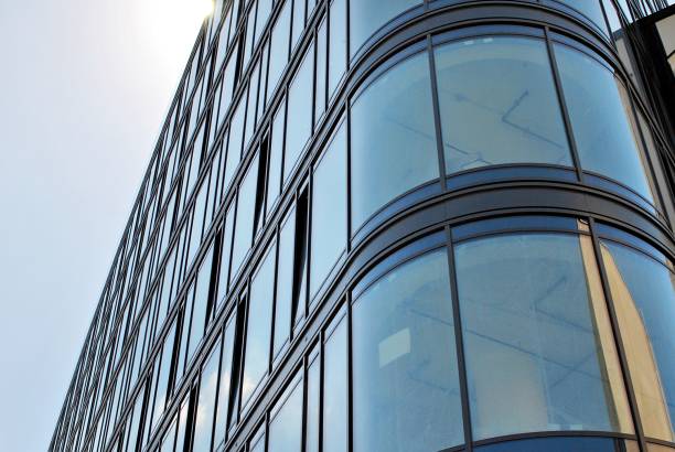 istock Modern building.Modern office building with facade of glass 831064110