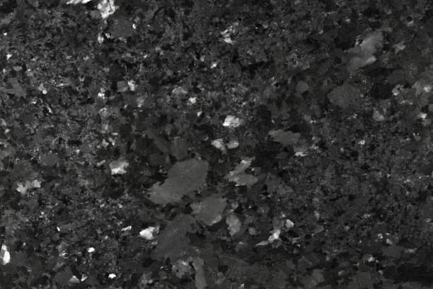 primer plano de textura de granito negro - surrounding wall architecture macro textured effect fotografías e imágenes de stock