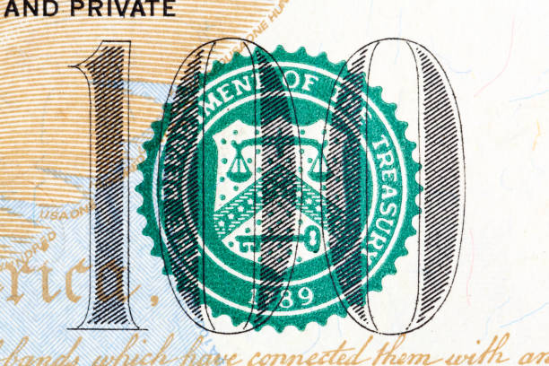 istock Number 100 on 100 dollar bill in macro 831075266