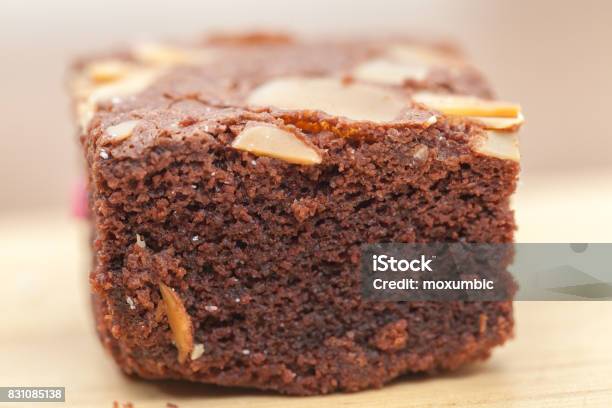 Close Up Of Of Brownie Cake On Wooden Plate Stock Photo - Download Image Now - Bakery, Black Color, Brown