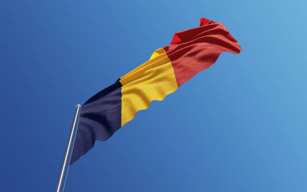 High quality 3d render of a Romanian flag waving with wind on a blue sky. Low angle view with copy space. Clipping path is included. Great use for Romanian politics and Romanian culture related concepts. Horizontal composition.