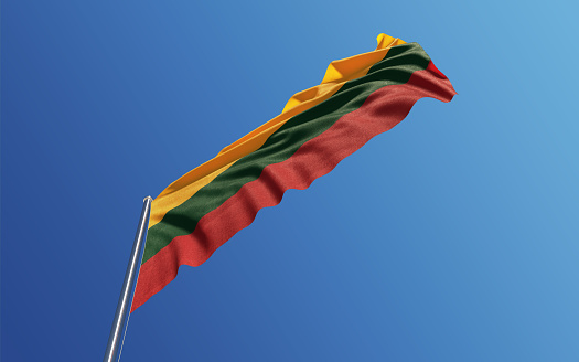 High quality 3d render of a Lithuanian flag waving with wind on a blue sky. Low angle view with copy space. Clipping path is included. Great use for Lithuanian  politics and Lithuanian culture related concepts. Horizontal composition.