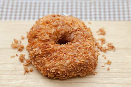 close up of Toasted Coconut doughnut