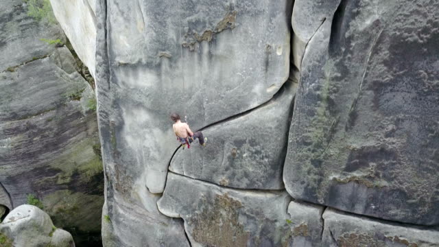 Man Rock Climber Rappelling