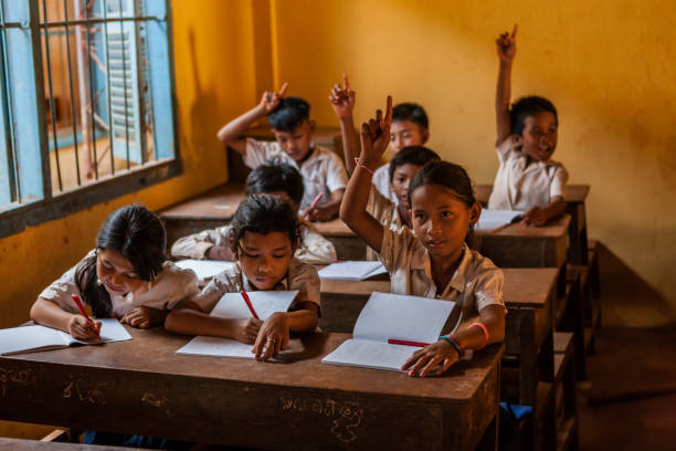 istock Cambodian school children during class, Tonle Sap, Cambodia 831103702