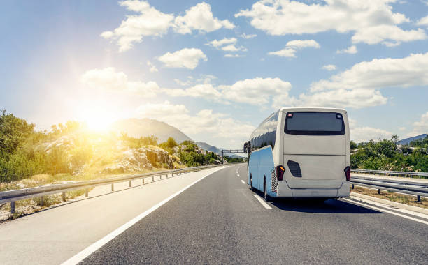 Bus rushes along the asphalt high-speed highway