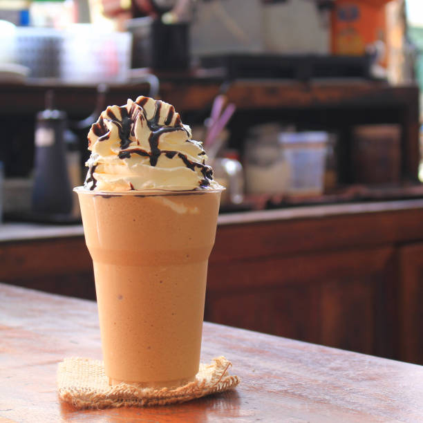 istock ice coffee and caramel smoothie on table in coffee shop 831117320