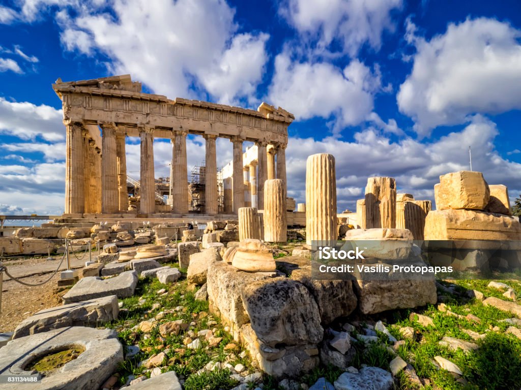 Parthenon the temple on the Athenian Acropolis, Greece, dedicated to the goddess Athena, whom the people of Athens considered their patron. Construction began in 447 BC when the Athenian Empire was at the peak of its power. It was completed in 438 BC although decoration of the building continued until 432 BC. Athens - Greece Stock Photo