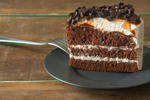 istock Cake on the wood floor 831135556