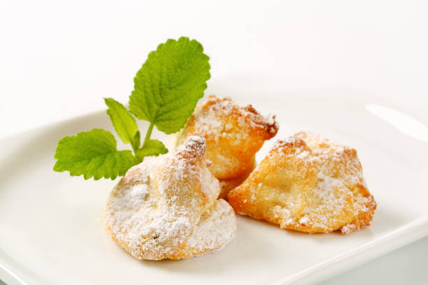 istock Delicious profiteroles with cream 831146432