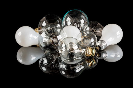 Glass bulbs that make light on a reflective surface