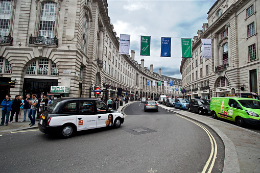 Regent Street, London, UK - August 10, 2017: Busy High Street in London. Full of tourist and taxies