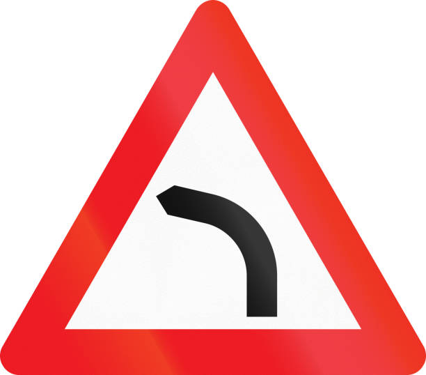 istock Warning road sign used in Denmark - Dangerous curve to left 831180134