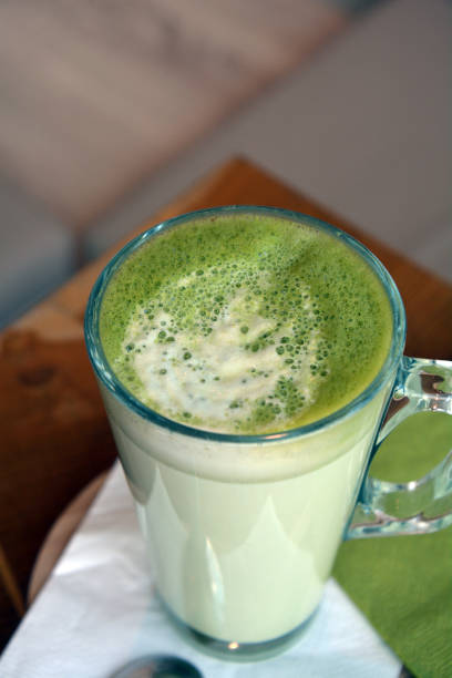 istock Matcha latte. Organic green tea on a glass cup. 831184442