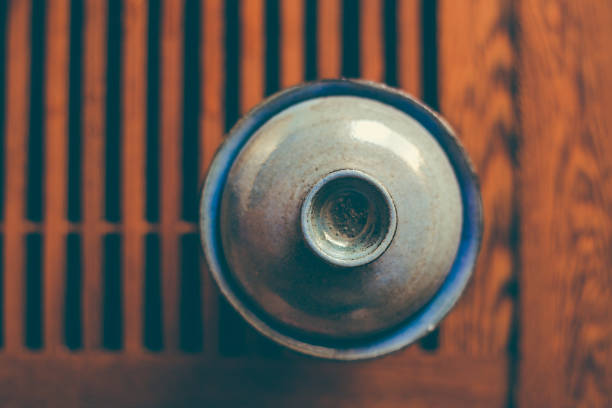 istock Chinese tea cup on wooden tea table, top  view, copy space 831187740