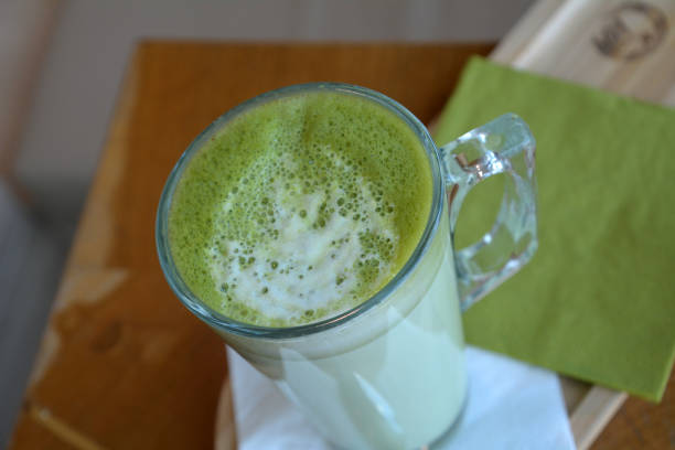 Matcha latte. Organic green tea on a glass cup.