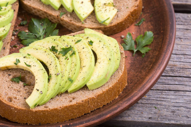 istock Healthy sandwich with bread and avocado 831199924