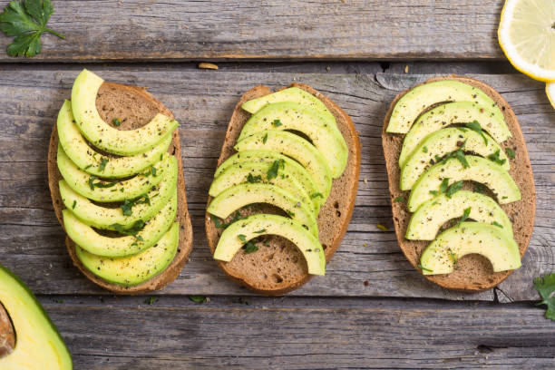 istock Healthy sandwich with bread and avocado 831199940