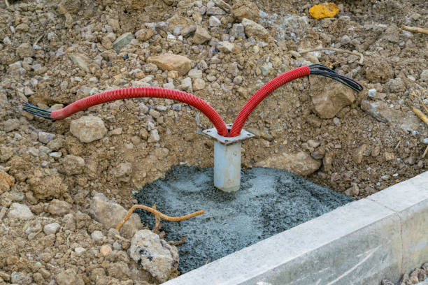 istock Installation of power cable in flexible PVC pipe 831202782