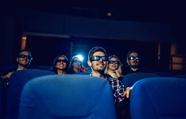 istock People sitting in cinema 831203008