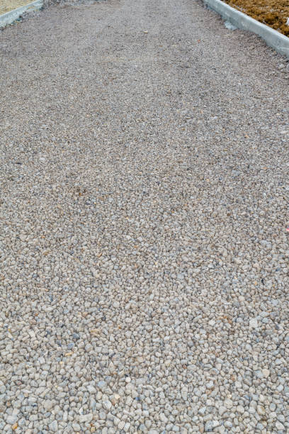 istock Unfinished asphalt country road. Under construction. 831209602