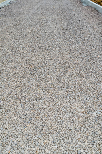 istock Unfinished asphalt country road. Under construction. 831209612