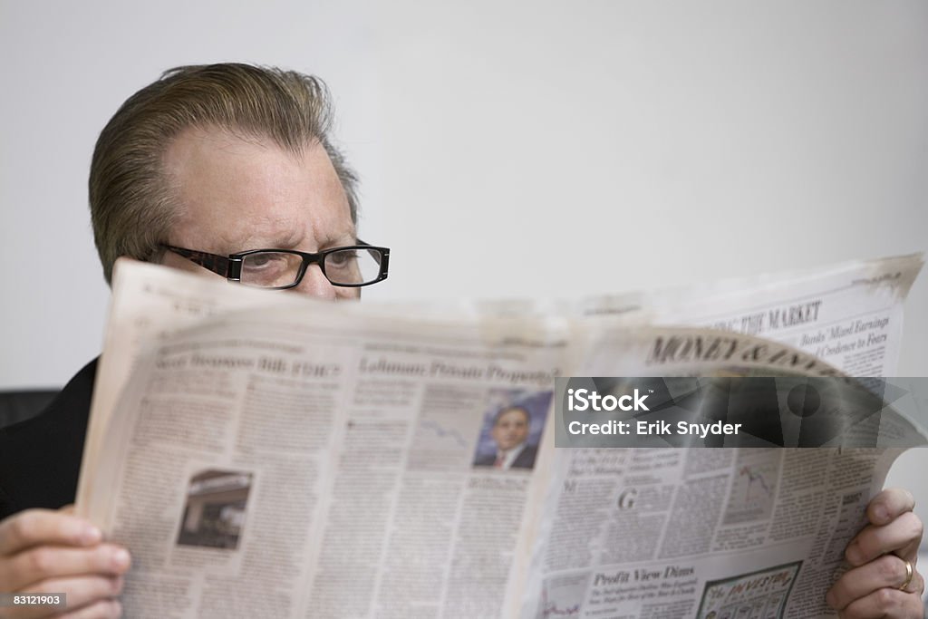 man reading newspaper  60-64 Years Stock Photo