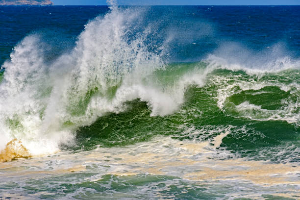 istock Stormy waves whit big waterspray 831225696