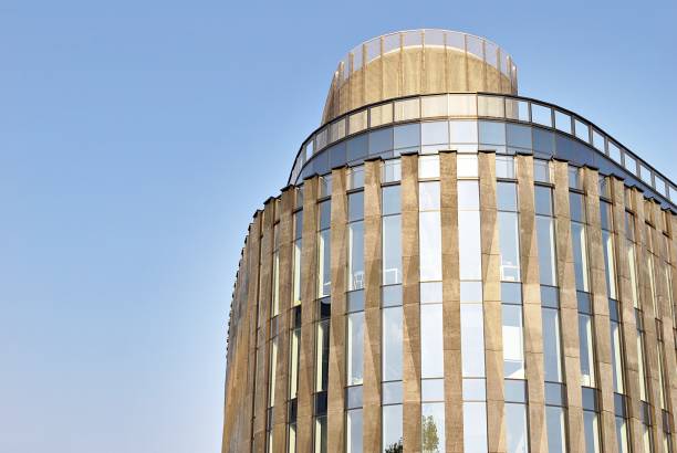 istock Modern building.Modern office building with facade of glass 831230076