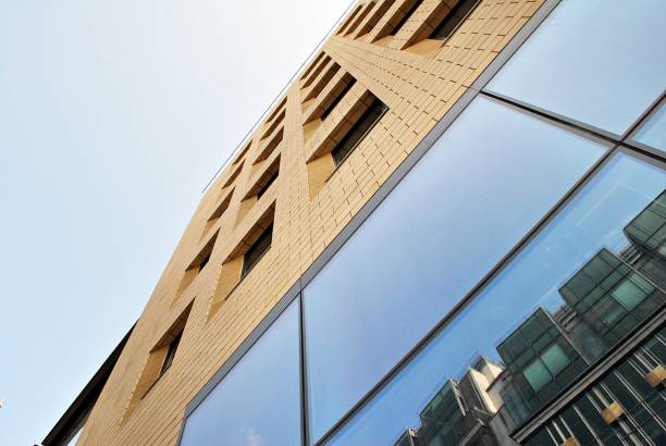 istock Modern building.Modern office building with facade of glass 831230368