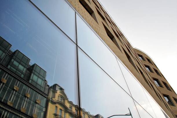 istock Modern building.Modern office building with facade of glass 831230490