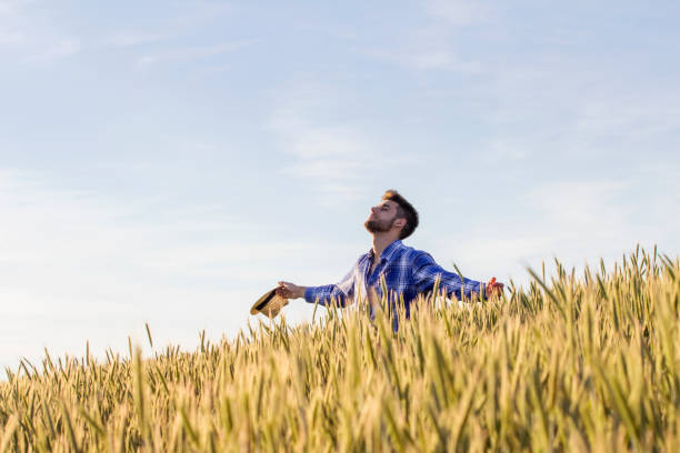 istock Young guy at the middle of the field 831233020