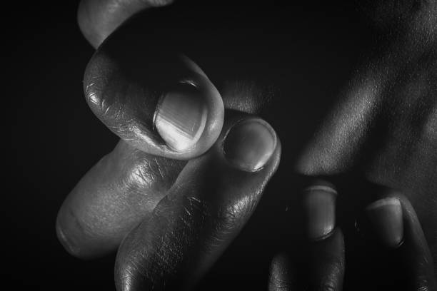 istock Human hand from abstract pose in studio tone into black and white 831239170