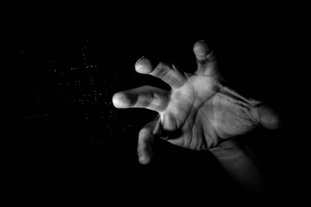 istock Human hand from abstract pose in studio tone into black and white 831239172