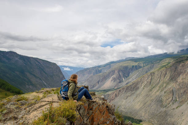 istock Girl, tourist, on a rock. 831252120