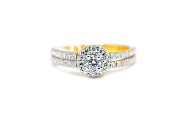 istock Gold ring with diamond isolated on white 831252346