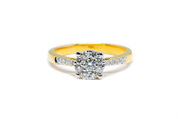 istock Gold ring with diamond isolated on white 831252656
