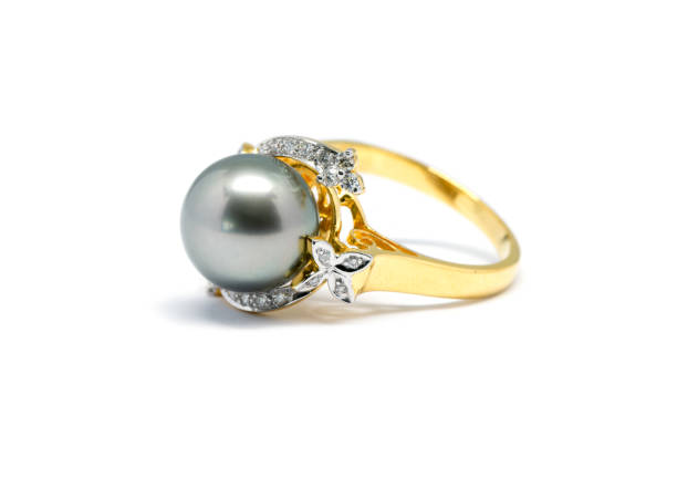 istock dark pearl with diamond and gold ring isolated 831253420