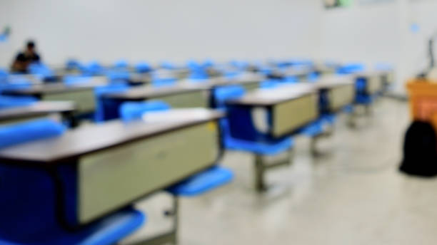 istock Blurred classroom in campus with noise and gain. 831257110