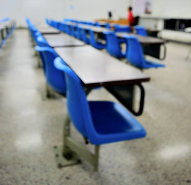 istock Blurred classroom in campus with noise and gain. 831257130