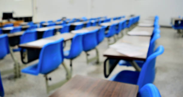 istock Blurred classroom in campus with noise and gain. 831257154