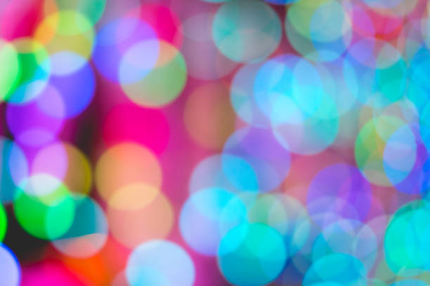 istock Colorful bokeh of light on black background. 831257326