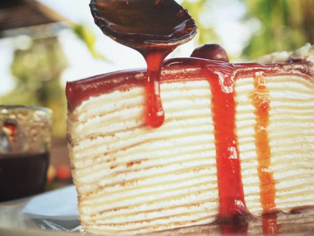 istock Crepe cake with strawberry jam 831263200