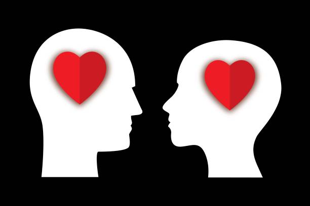 istock Man Woman Paper Heart Heads 831267228